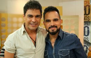 Mesmo com costela quebrada, Luciano acompanhou ZezA� em show (Foto: ReproduA�A?o)