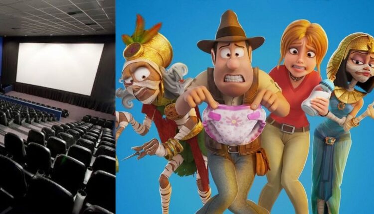 Interior de sala de cinema vazia com poltronas vermelhas